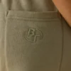 Bawełniane spodnie dresowe z polaru z średnim stanem w kolorze khaki Bawełniane spodnie dresowe z polaru z średnim stanem w kolorze khaki