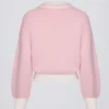 Bawełniany sweter oversize z dekoltem w serek w kolorze pudrowego różu Bawełniany sweter oversize z dekoltem w serek w kolorze pudrowego różu