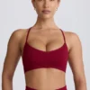 Bezszwowy biustonosz sportowy Super Sculpt z krzyżującymi się ramiączkami na plecach w kolorze bordowym Bezszwowy biustonosz sportowy Super Sculpt z krzyżującymi się ramiączkami na plecach w kolorze bordowym