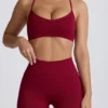 Bezszwowy biustonosz sportowy Super Sculpt z krzyżującymi się ramiączkami na plecach w kolorze bordowym Bezszwowy biustonosz sportowy Super Sculpt z krzyżującymi się ramiączkami na plecach w kolorze bordowym