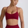 Bezszwowy biustonosz sportowy Super Sculpt z krzyżującymi się ramiączkami na plecach w kolorze bordowym Bezszwowy biustonosz sportowy Super Sculpt z krzyżującymi się ramiączkami na plecach w kolorze bordowym