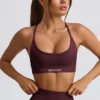 Bezszwowy biustonosz sportowy Super Sculpt z odkrytymi plecami w kolorze bordowym Bezszwowy biustonosz sportowy Super Sculpt z odkrytymi plecami w kolorze bordowym