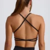 Bezszwowy biustonosz sportowy Super Sculpt z odkrytymi plecami w kolorze czarnym Bezszwowy biustonosz sportowy Super Sculpt z odkrytymi plecami w kolorze czarnym