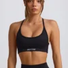 Bezszwowy biustonosz sportowy Super Sculpt z odkrytymi plecami w kolorze czarnym Bezszwowy biustonosz sportowy Super Sculpt z odkrytymi plecami w kolorze czarnym