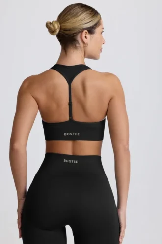Bezszwowy biustonosz sportowy Super Sculpt z tyłem w kształcie litery T w kolorze czarnym Bezszwowy biustonosz sportowy Super Sculpt z tyłem w kształcie litery T w kolorze czarnym