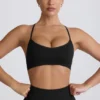 Bezszwowy stanik sportowy Super Sculpt z krzyżującymi się ramiączkami na plecach w kolorze czarnym Bezszwowy stanik sportowy Super Sculpt z krzyżującymi się ramiączkami na plecach w kolorze czarnym