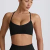 Bezszwowy stanik sportowy Super Sculpt z krzyżującymi się ramiączkami na plecach w kolorze czarnym Bezszwowy stanik sportowy Super Sculpt z krzyżującymi się ramiączkami na plecach w kolorze czarnym