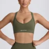 Bezszwowy stanik sportowy Super Sculpt z krzyżującymi się ramiączkami na plecach w kolorze jasnozielonym Bezszwowy stanik sportowy Super Sculpt z krzyżującymi się ramiączkami na plecach w kolorze jasnozielonym