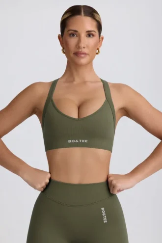 Bezszwowy stanik sportowy Super Sculpt z krzyżującymi się ramiączkami na plecach w kolorze jasnozielonym Bezszwowy stanik sportowy Super Sculpt z krzyżującymi się ramiączkami na plecach w kolorze jasnozielonym