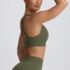 Bezszwowy stanik sportowy Super Sculpt z krzyżującymi się ramiączkami na plecach w kolorze jasnozielonym Bezszwowy stanik sportowy Super Sculpt z krzyżującymi się ramiączkami na plecach w kolorze jasnozielonym