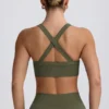 Bezszwowy stanik sportowy Super Sculpt z krzyżującymi się ramiączkami na plecach w kolorze jasnozielonym Bezszwowy stanik sportowy Super Sculpt z krzyżującymi się ramiączkami na plecach w kolorze jasnozielonym