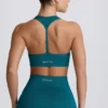 Bezszwowy stanik sportowy Super Sculpt z tyłem w kształcie litery T w kolorze turkusowym Bezszwowy stanik sportowy Super Sculpt z tyłem w kształcie litery T w kolorze turkusowym