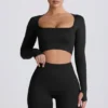 Bezszwowy top z długim rękawem Super Sculpt w kolorze czarnym Bezszwowy top z długim rękawem Super Sculpt w kolorze czarnym