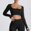 Bezszwowy top z długim rękawem Super Sculpt w kolorze czarnym Bezszwowy top z długim rękawem Super Sculpt w kolorze czarnym