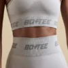 Bezszwowy top z tyłu w stylu racerback w kolorze srebrnym Bezszwowy top z tyłu w stylu racerback w kolorze srebrnym