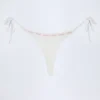 Białe doły od bikini Vernazza z angielską koronką i wiązaniem z boku Białe doły od bikini Vernazza z angielską koronką i wiązaniem z boku