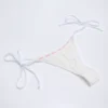 Białe doły od bikini Vernazza z angielską koronką i wiązaniem z boku Białe doły od bikini Vernazza z angielską koronką i wiązaniem z boku