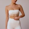 Biustonosz bandeau z krzyżującymi się ramiączkami na plecach w kolorze delikatnej bieli Biustonosz bandeau z krzyżującymi się ramiączkami na plecach w kolorze delikatnej bieli