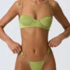 Biustonosz bikini z fiszbinami i zdobieniami Sundial w kolorze gruszkowej zieleni