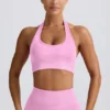 Biustonosz sportowy Define Luxe z wiązaniem na szyi w kolorze Bubblegum Pink Biustonosz sportowy Define Luxe z wiązaniem na szyi w kolorze Bubblegum Pink