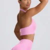 Biustonosz sportowy Define Luxe z wiązaniem na szyi w kolorze Bubblegum Pink Biustonosz sportowy Define Luxe z wiązaniem na szyi w kolorze Bubblegum Pink