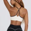 Biustonosz sportowy Soft Active z dekoltem w kształcie serca w kolorze białym Biustonosz sportowy Soft Active z dekoltem w kształcie serca w kolorze białym
