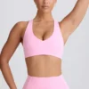 Biustonosz sportowy Soft Active z dekoltem w serek w kolorze jasnoróżowym