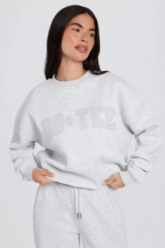Bluza oversize z okrągłym dekoltem w kolorze szarym melanżowym Bluza oversize z okrągłym dekoltem w kolorze szarym melanżowym