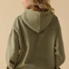 Bluza z kapturem oversize w kolorze delikatnej oliwki Bluza z kapturem oversize w kolorze delikatnej oliwki