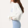 Bluza z kapturem oversize z aplikacją w kolorze mlecznym
