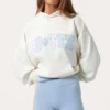 Bluza z kapturem oversize z aplikacją w kolorze mlecznym