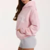 Bluza z kapturem oversize z aplikacją w kolorze pudrowym Bluza z kapturem oversize z aplikacją w kolorze pudrowym