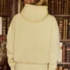 Bluza z kapturem oversize z haftem w kolorze delikatnej żółci Bluza z kapturem oversize z haftem w kolorze delikatnej żółci