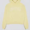 Bluza z kapturem oversize z haftem w kolorze delikatnej żółci Bluza z kapturem oversize z haftem w kolorze delikatnej żółci
