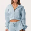 Bluza z kapturem oversize z zamkiem w kolorze pudrowego błękitu Bluza z kapturem oversize z zamkiem w kolorze pudrowego błękitu