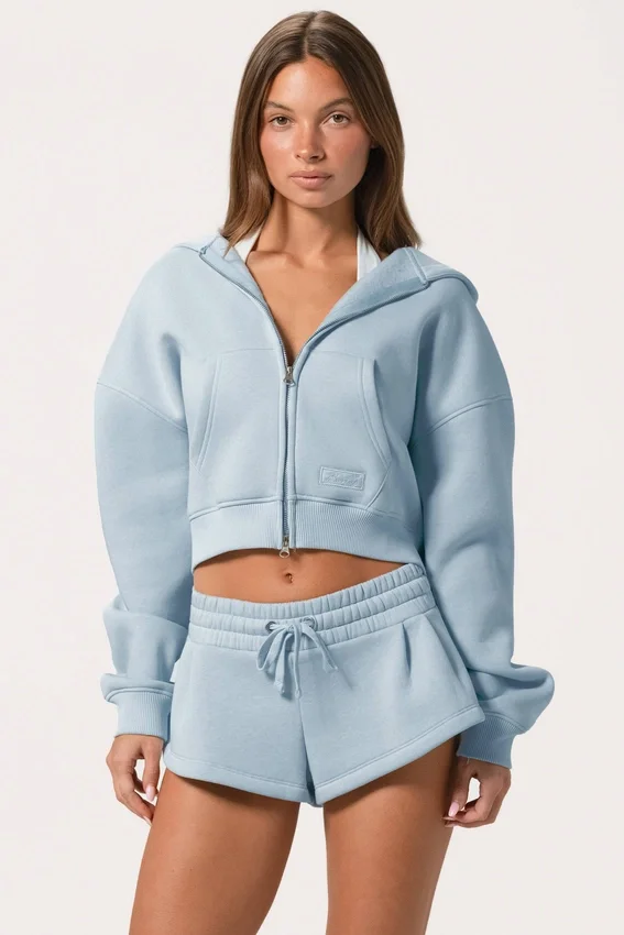 Bluza z kapturem oversize z zamkiem w kolorze pudrowego błękitu Bluza z kapturem oversize z zamkiem w kolorze pudrowego błękitu