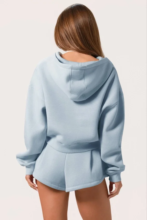 Bluza z kapturem oversize z zamkiem w kolorze pudrowego błękitu Bluza z kapturem oversize z zamkiem w kolorze pudrowego błękitu