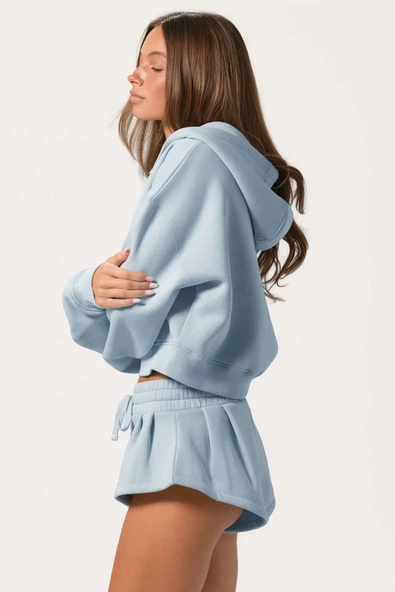 Bluza z kapturem oversize z zamkiem w kolorze pudrowego błękitu Bluza z kapturem oversize z zamkiem w kolorze pudrowego błękitu