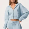 Bluza z kapturem oversize z zamkiem w kolorze pudrowego błękitu Bluza z kapturem oversize z zamkiem w kolorze pudrowego błękitu