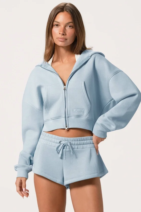 Bluza z kapturem oversize z zamkiem w kolorze pudrowego błękitu Bluza z kapturem oversize z zamkiem w kolorze pudrowego błękitu