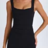 Czarna sukienka Mini Brittany z drapowanym, usztywnionym gorsetem Czarna sukienka Mini Brittany z drapowanym, usztywnionym gorsetem