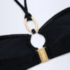 Czarny top bikini Savai z marszczonym dekoltem typu halterneck i metalowymi detalami Czarny top bikini Savai z marszczonym dekoltem typu halterneck i metalowymi detalami
