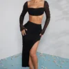 Czarny top z ozdobnym dekoltem typu cowl La Desirade Czarny top z ozdobnym dekoltem typu cowl La Desirade
