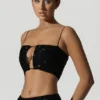 Czarny top z wycięciami i zdobieniami Ariana Czarny top z wycięciami i zdobieniami Ariana