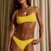 Górka bikini Naxos z okrągłym dekoltem w kolorze złocistożółtym Górka bikini Naxos z okrągłym dekoltem w kolorze złocistożółtym