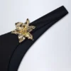 Fioletowe doły od bikini Beqa z metalowymi detalami w kolorze czarnym Fioletowe doły od bikini Beqa z metalowymi detalami w kolorze czarnym