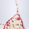 Góry od bikini Noia Micro Triangle w czerwony kwiatowy wzór Góry od bikini Noia Micro Triangle w czerwony kwiatowy wzór