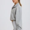 Krótka bluza z zamkiem 1/4 w kolorze szarym melanżowym Krótka bluza z zamkiem 1/4 w kolorze szarym melanżowym