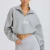 Krótka bluza z zamkiem 1/4 w kolorze szarym melanżowym Krótka bluza z zamkiem 1/4 w kolorze szarym melanżowym