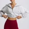 Krótka bluza z zamkiem 1/4 w kolorze szarym melanżowym Krótka bluza z zamkiem 1/4 w kolorze szarym melanżowym